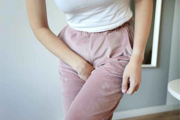 woman running for the toilet because of urinary incontinence Lewisham